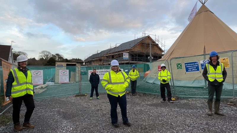 Rebecca Evans with Coastal and Down to Earth representatives on the Pennard site.