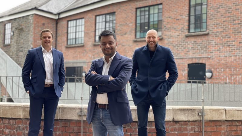 From left, Gareth Stockman ,CEO - Marine Power Systems; Rokib Uddin, Commercial Surveyor - Coastal; David Blyth, Director - BP2 outside the redeveloped Warehouse at Swansea's Urban Village.